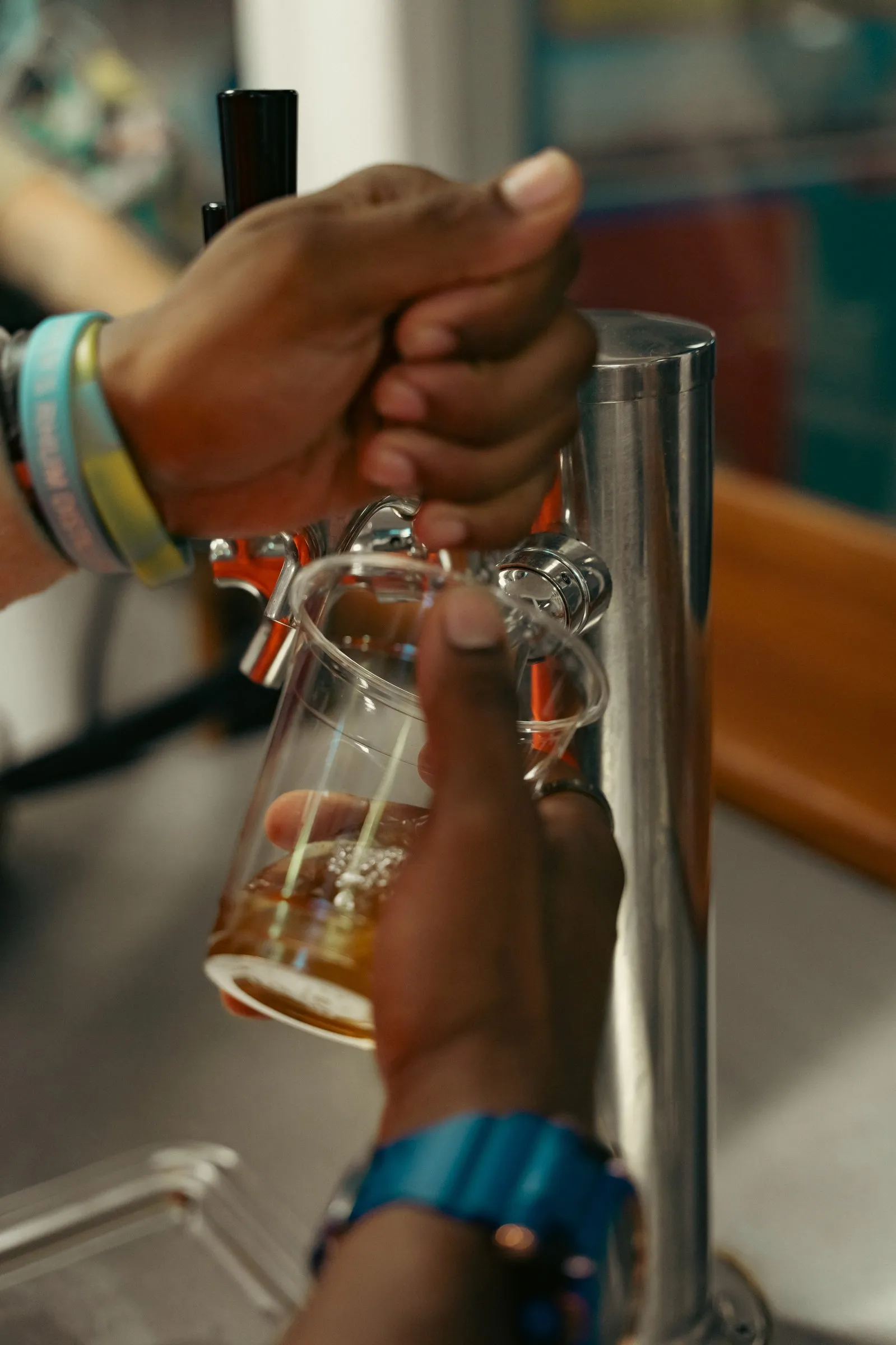 A bartender pours a fresh beer straight from the tap